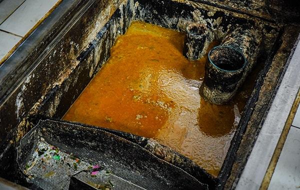 grease trap cleaning helps prevent grease and oil from entering the drain system, hence reducing the risk of ecological contamination